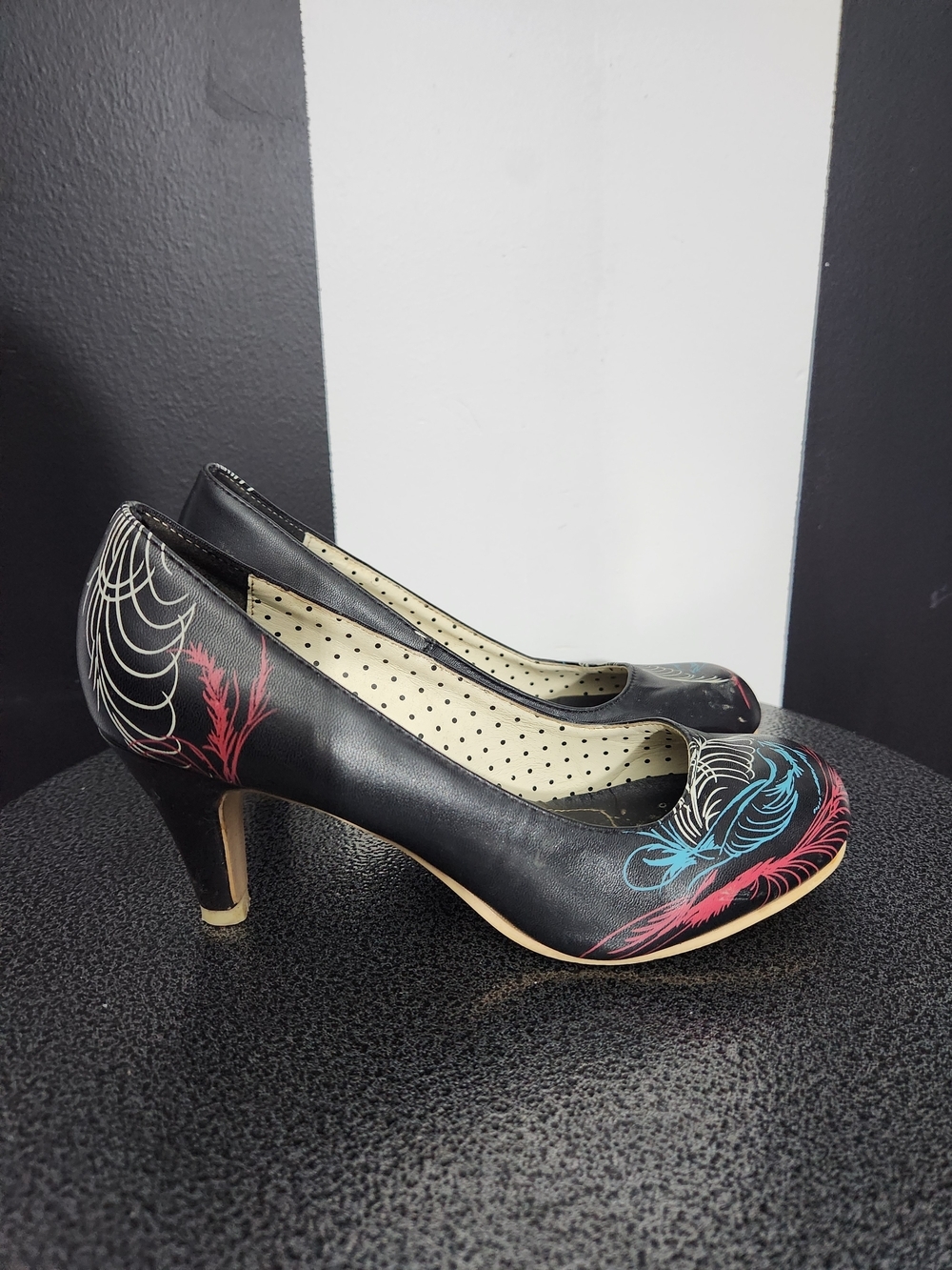 tuk Black Heels with Pink and Blue Feather Motifs